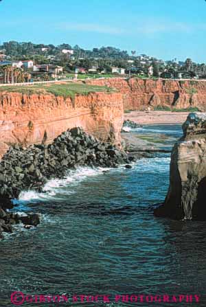 Stock Photo #9401: keywords -  area california cliff cliffs coast coastal crash diego dissolve erode eroded eroding erosion force formation geologic geological geology homes of power san sea seashore sediment sedimentary sedimentation sediments shore shoreline soft soil splash steep strata stratum surf vert water wave waves