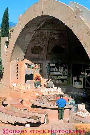 Stock Photo #17817: keywords -  alternative arch arches arcosanti arizona artist artists building buildings cement communities community concrete crafting crafts craftsmen desert dome domes enclave experimental isolated men people person private remote resident social society town towns vert working