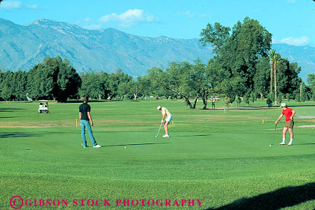 Stock Photo #11685: keywords -  arizona course el golf golfer golfers golfing grass green horz lawn men people recreation rio southwest sport summer tucson west western