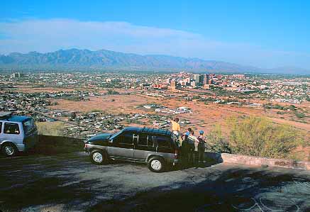 Stock Photo #17766: keywords -  above arid arizona center cities city climate deserts district dry elevate elevated high horz hot in overlook overview overviewing panaoramic park parks peak people point public scenic sentinel tucson urban view views