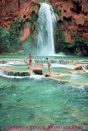 Stock Photo #12731: keywords -  adolescent adolescents arizona canyon canyons children creek creeks falls flow flowing flows geologic geological geology girl girls gravity havasu indian outdoor play playing recreation reservation river rivers runoff southwest summer supai swim swimmers swimming travertine vert water waterfall waterfalls west youth