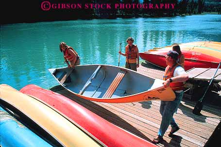 Stock Photo #12085: keywords -  alberta banff boat boats bow bright canada canoe canoeing canoes dock docks fiberglass horz launching material onto people plastic recreation river rivers synthetic water