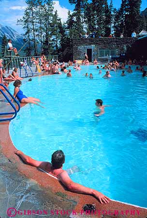 Stock Photo #12487: keywords -  alberta attraction banff canada hot outdoor outside people pool pools relax relaxing resort spring springs summer swim swimming tourist tub upper vacation vert water