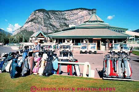 Stock Photo #18625: keywords -  alberta bag bags banff canada clubhouse course courses equipment gear golf golfer golfers golfing golfs horz hotel hotels mountain mountains national park parks people person province provinces public recreation region rocky sport springs