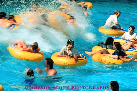 Stock Photo #12516: keywords -  action activity alberta canada children edmonton enclosed float floats fun horz in inside interior mall motion movement moving park parks play playing pool pools recreation ring splash splashes splashing thrill thrilling thrills water waterpark wave waves west world