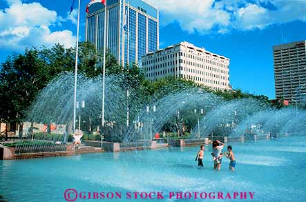 Stock Photo #12520: keywords -  albera canada child children cities city downtown edmonton fountain fountains fun hall horz hot in play playing pool pools public refresh refreshing summer swim swimming urban warm water