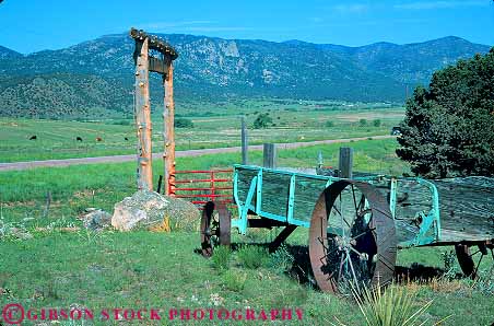 Stock Photo #18707: keywords -  canon city colorado countryside equipment farm farms gate gates horz landscape mountain mountains old ranch ranches region rockies rocky rural scenery scenic tractor tractors vintage