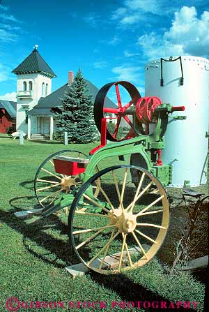Stock Photo #18769: keywords -  antique antiques colorado culture display displays equipment farm farms gunnison heritage implements metal mountain mountains museum museums old pioneer pullies pully region rockies rocky state steam steel vert vintage wheel wheels