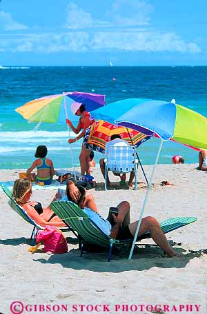 Stock Photo #17139: keywords -  atlantic beach beaches coast coastal coasts colorful destination florida fort ft ft. lauderdale leisure ocean people person relax relaxation relaxed relaxing resort resorts sand sea seashore shade shore shores south sunny sunshine travel umbrella umbrellas vacation vert warm