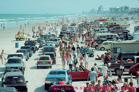 Stock Photo #12872: keywords -  auto autos beach beaches car cars coast coastal crowd crowded daytona destination florida horz leisure ocean park parked parking people recreation resort resorts sand shore shoreline south spring sunny sunshine travel vacation