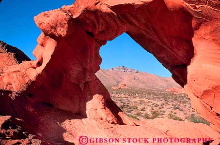 Stock Photo #17646: keywords -  arch arched arches desert deserts earth eroded eroding erosion fire formations geologic geological geology horz landscape natural nature nevada of park parks public red rock rocks sandstone scenery scenic science sedimentary state stone tunnel tunnels valley west western