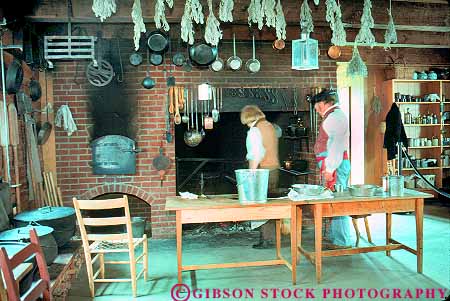 Stock Photo #18434: keywords -  american building dressed era exploration fort forts ft ft. historic history horz in inside interior interiors kitchen log logs migration military national northwest park parks people person portray portraying portrays public reconstructed reconstruction region site sites state stockade stockades timber vancouver washington westward wood wooden working