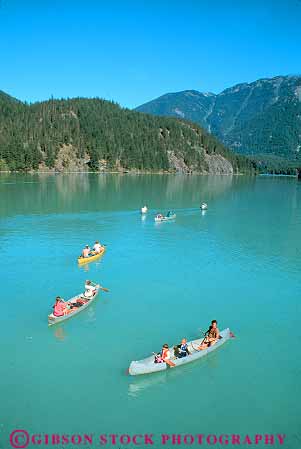 Stock Photo #18448: keywords -  boat boating boats calm canoe canoeing canoer canoers canoes cascade cascades diablo flat group groups lake lakes landscape mountain mountains national nature north northwest paddling park parks people person public quiet recreation region scenery scenic serene sport state vert washington water