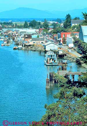 Stock Photo #18453: keywords -  attraction buildings coast coastal conner destination dock docks la northwest of puget quaint region small sound state town towns travel vert washington water waterfront wharf wharfs