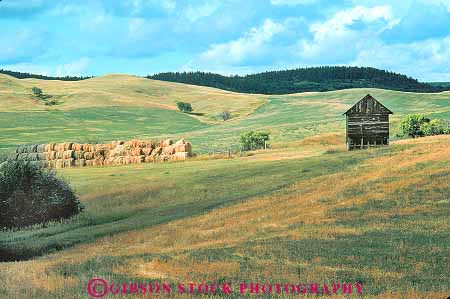 Stock Photo #18657: keywords -  agricultural agriculture and arvada farm farming farms field fields harvest harvested hay hill hills horz landscape near scenery scenic shed west western wyoming