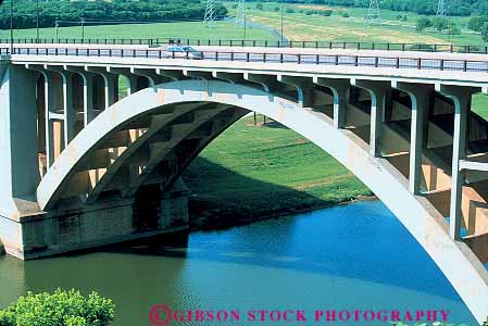 Stock Photo #17343: keywords -  across arch arched arches bridge bridges cement concrete cross crosses crossing curve curves curving design engineered engineering ft graceful highway horz over poured river road roadway round rounded span spanning spans street structure structures support supported supports texas trinity worth