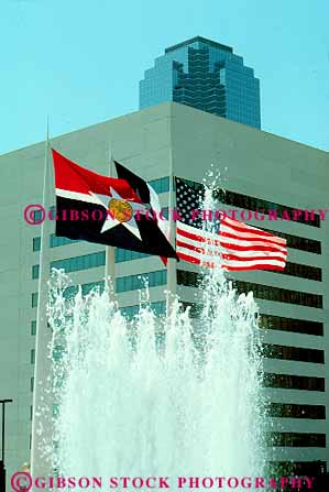 Stock Photo #11831: keywords -  american cities city cityscape dallas downtown flag flags fountain fountains splash spray state texas three vert water