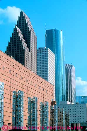 Stock Photo #17418: keywords -  architecture building buildings contract contrasted contrasting design different differs highrise houston modern new office shape shaped shapes style texas vert