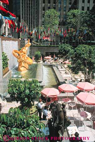 Stock Photo #9078: keywords -  cafe cafes center city courtyard dine dining downtown gold golden mall new outdoor outside park plaza plazas rockefeller sculpture sculptures statuary statue summer vert york