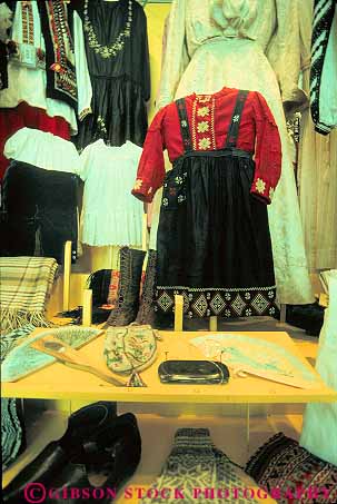 Stock Photo #12710: keywords -  artifact artifacts city clothes clothing cultural culture display displaying displays dress ellis era european foreign foreigner historic history immigrant immigrants immigrate immigrating immigration international island museum museums new utinsile utinsiles vert york