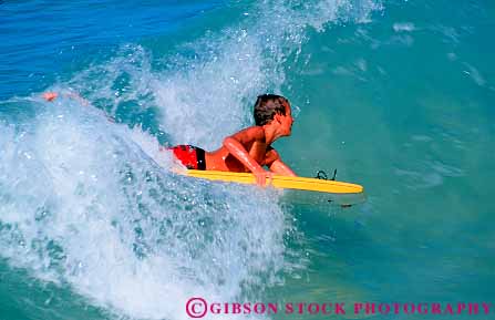 Stock Photo #13174: keywords -  big boogieboard boy hawaii hawaiian horz island islands kailua kona recreation splash splashes splashing sport surf surfer surfing swim swimming tropical vacation water wave waves