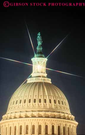 Stock Photo #8744: keywords -  america american americana architecture building buildings capitol capitols columbia dark dc design district dome domes dusk evening federal government headquarters national night of office special starburst states sunset sunsets united usa vert washington