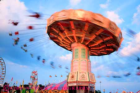 Stock Photo #12426: keywords -  action activity annual centrifugal circular event events fair fairs festival festivals force fun horz lift lifting lifts maryland motion move moving outward outwards play playing recreation ride rotate rotates rotating rotation round spin spinning spins state summer thrill timonium