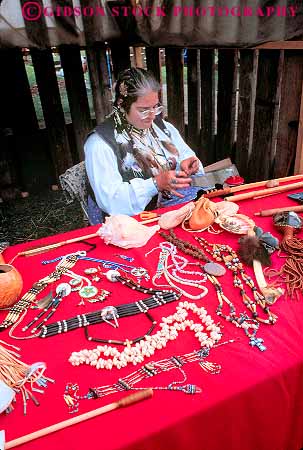 Stock Photo #18160: keywords -  activities activity american americans annual colorful craft crafted crafts ethnic event events fair fairs festival festivals fun hand in indian indians jewelry maryland minority native people person play recreation selling state summer timonium vend vending vendor vendors vends vert woman