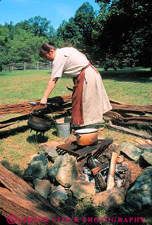 Stock Photo #13309: keywords -  blue campfire cook cooking cooks countryside era farm fire fires highway highways historic history humpback landscape living near park parks parkway parkways pioneer portray portrays primitive reenactment ridge rocks rural scenery scenic vert virginia woman