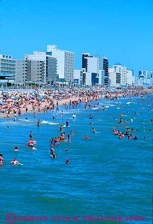 Stock Photo #17073: keywords -  activity atlantic beach beaches coast coastal crowd crowded crowds fun hot ocean people person play recreation resort resorts sand sea seashore shore summer surf swim swimmer swimmers swimming vacation vert virginia warm water wet