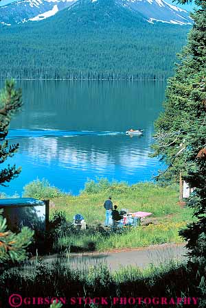 Stock Photo #18370: keywords -  camp camper campers campground campgrounds camping campsite campsites cascade cascades couple couples diamond lake lakes motorboat motorboats mountain mountains northwest oregon people person recreation summer vacation vacationing vert water