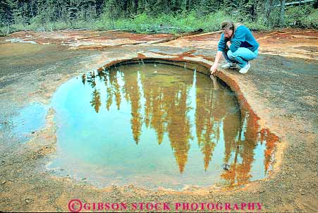 released woman looking at Paint Pots in Kootenay National Park British  Columbia C Stock Photo 18583