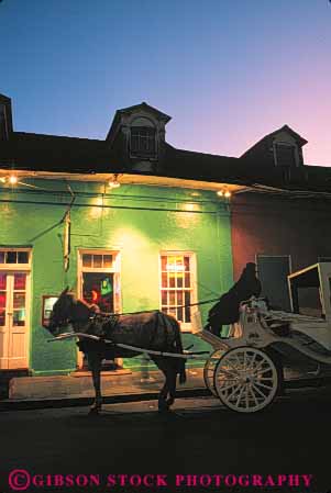 Stock Photo #8543: keywords -  bright building buildings carriage dark destination dusk evening french horse lighting lights louisiana new night orleans people quarter recreation silhouette silhouettes social street streets sunset travel usa vacation vert