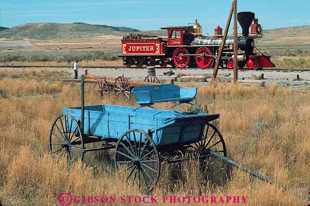 Stock Photo #13657: keywords -  american and clean colorful duplicate duplicated engine engines equipment golden hardware heavy historic history horz identical jupiter locomotive locomotives national old painted park piece pieces pretty promontory public railroad railroads replica replicas replicate replicated shiny site sites spike steam train trains transcontinental transportation utah vintage wagon wagons