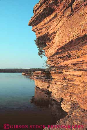 Stock Photo #13980: keywords -  arkansas cliffs dusk ferry formation formations freshwater geologic geological geology greers lake lakes layer layers rock rocks sandstone sediment sedimentary shore shoreline strata stratum vert water