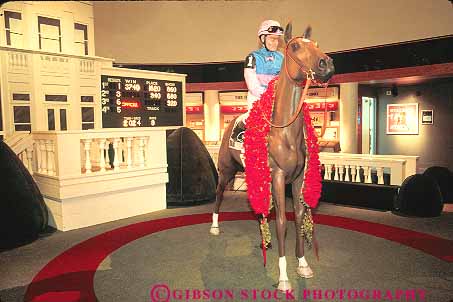 Stock Photo #14140: keywords -  animal animals bet bets betters betting churchill course courses downs gamble gambling horse horses horz interior jockey jockeys kentucky landmark louisville mammal mammals model models museum museums people race racer racers races racing replica replicate track tracks