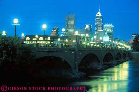 Stock Photo #17543: keywords -  bridge bridges building buildings business center cities city cityscape cityscapes commercial corporate dark downtown dusk evening foot highrise horz indiana indianapolis lighting lights modern new night office over river rivers skyline skylines urban white