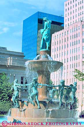 Stock Photo #19033: keywords -  art artful artisitic bronze building buildings cities city cityscape cityscapes civic depew display displays downtown fountain fountains indiana indianapolis memorial public statue statues urban vert water