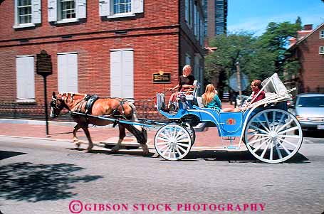 Stock Photo #12777: keywords -  buildings carriage carriages cities city cityscape cityscapes downtown horse horses horz pennsylvania philadelphia ride riders riding tour touring tourist tourists tours urban