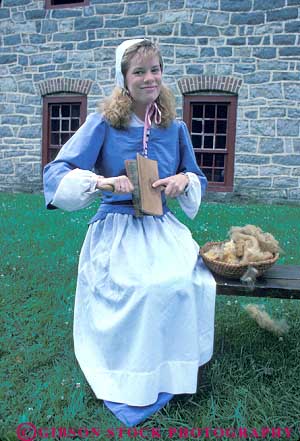 Stock Photo #19737: keywords -  bethlehem card carding cards colonial costume costumed costumes dressed era girl heritage historic history industrial lifestyle living local museum museums old pennsylvania person portray portraying portrays quarter reenact reenacting reenactment site sites tradition traditional vert vintage woman wool young