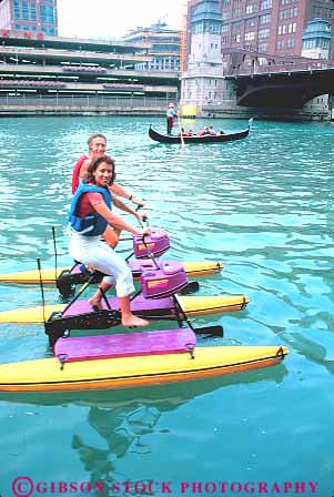 Stock Photo #18935: keywords -  activities activity bikes chicago cities city downtown exercise exercising fun hydrobike hyrobikes illinois material outdoor outdoors outside peddle peddling people person play playing recreation river rivers synthetic vert water