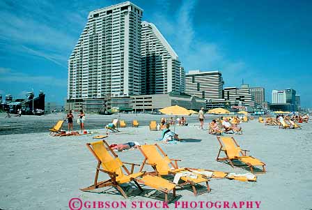 Stock Photo #14486: keywords -  amusement amusements atlantic attraction beach beaches casino casinos chair chairs city coast coastal destination fun furniture gamble gambling gaming horz jersey leisure lounge lounges new people play playing recreation relax relaxes relaxing resort resorts sea seashore shore shoreline summer sunny sunshine tourist travel vacation vacations yellow