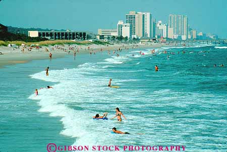 Stock Photo #14677: keywords -  atlantic beach beaches carolina coast coastal destination grand horz hot in leisure myrtle ocean people recreation resort resorts sand sea shore shoreline south strand sunny sunshine surf swim swimmer swimmers swimming travel vacation warm water wave waves