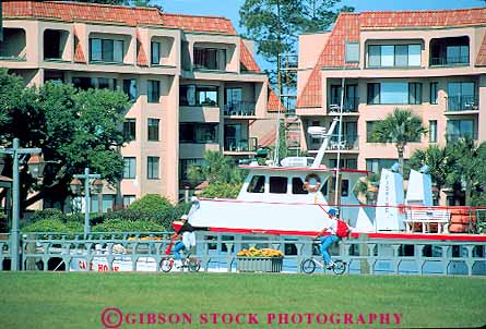 Stock Photo #14708: keywords -  bicycles bicyclist bicyclists bike bikes carolina coast coastal collapsible communities community couple cove harbor head hilton horz leisure marina marinas people recreation resort resorts riding shelter shore shoreline south sport summer vacation