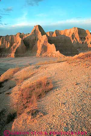 Stock Photo #14778: keywords -  badlands dakota dawn eroded erodes eroding erosion formations national park parks prairie public sedimentary south sunrise vert