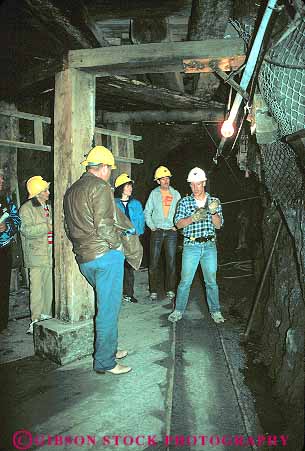 Stock Photo #14830: keywords -  cave cavern caverns caves equipment geologic geological geology group groups hardhats historic history idaho machine machinery metal mine miner miners mining people precious rock shaft shafts sierra silver tour touring tourists tours underground vert wallace