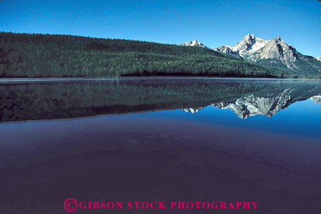 Stock Photo #14922: keywords -  area calm clean flat forest forests horz idaho lake lakes landscape mirror mirrors mountain mountains national nature peak peaks pristine range recreation reflect reflecting reflection reflects region rocky sawtooth scenery scenic smooth stanley tree water wild wilderness