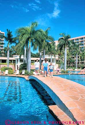 Stock Photo #14984: keywords -  child children destination families family hawaii hawaiian hotel hotels island islands kauai landscape lihue marriott people pool pools resort resorts scenery scenic swim swimming tourist tourists travel traveler travelers tropic tropical tropics vacation vacationing vacations vert