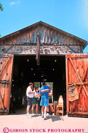 Stock Photo #18055: keywords -  amusement attraction attractions barn barns branson crafts cultural culture destination heritage hollow missouri mutton park parks people person recreation shop shops tourist travel vert village wood wooden