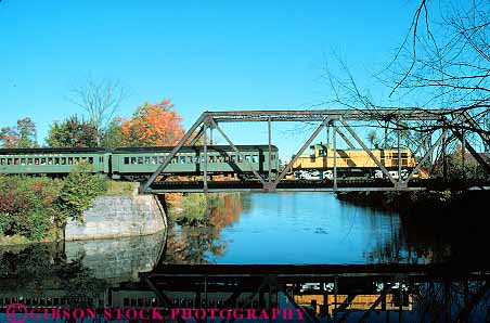 Stock Photo #15149: keywords -  autumn bridge bridges color england excursion fall foliage horz morrisville new railroad railroading railroads reflection region season seasons train trains vermont water